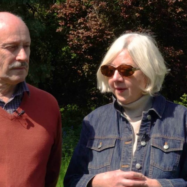 Photograph of the Deans Man and Woman standing next to eachother