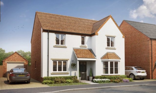 Large White home with brown roof tiles and 5 windows on the front