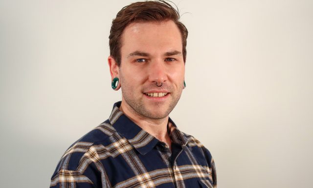 Man in short smiling