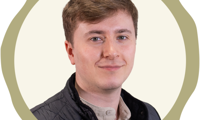 An corporate profile photo of Ben Webster