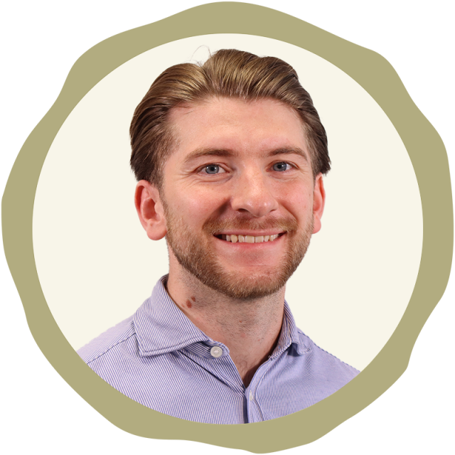 Picture shows Owen Weaver in an open necked short, smiling at the camera. It is a corporate image, used within a Richborough graphic.