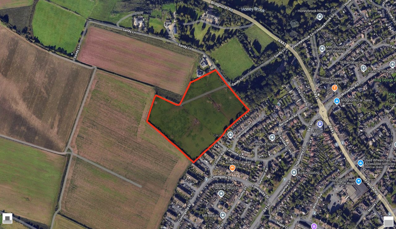 Aerial image with red line boundary